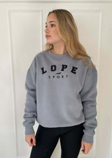 lope crew, over size grå college tröja med broderat lope i svart