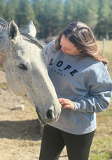 Grå Lope sport oversize college tröja med broderad logo i svart. modell i storlek large