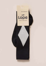 fCOMPETITION SOCKS RIDSTRUMPOR MED KOMPRESSION - BLACK + WHITE DIAMONDavorit ridstrumpor från lope. klassiskt rombmönster i svart & vitt. strumpor med kompression