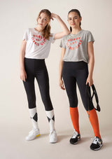 firm compression riding socks, stretchy and durable blend of polyamide and elastane. white with black romb. firm compression riding socks, stretchy and durable blend of polyamide and elastane. solid black. knee high long comfortable compression socks. white lope logo. stylish, performance enhancing sport socks. the core riding leggings riding tights competition socks
