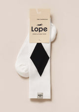 firm compression riding socks, stretchy and durable blend of polyamide and elastane. white with black romb. firm compression riding socks, stretchy and durable blend of polyamide and elastane. solid black. knee high long comfortable compression socks. white lope logo. stylish, performance enhancing sport socks