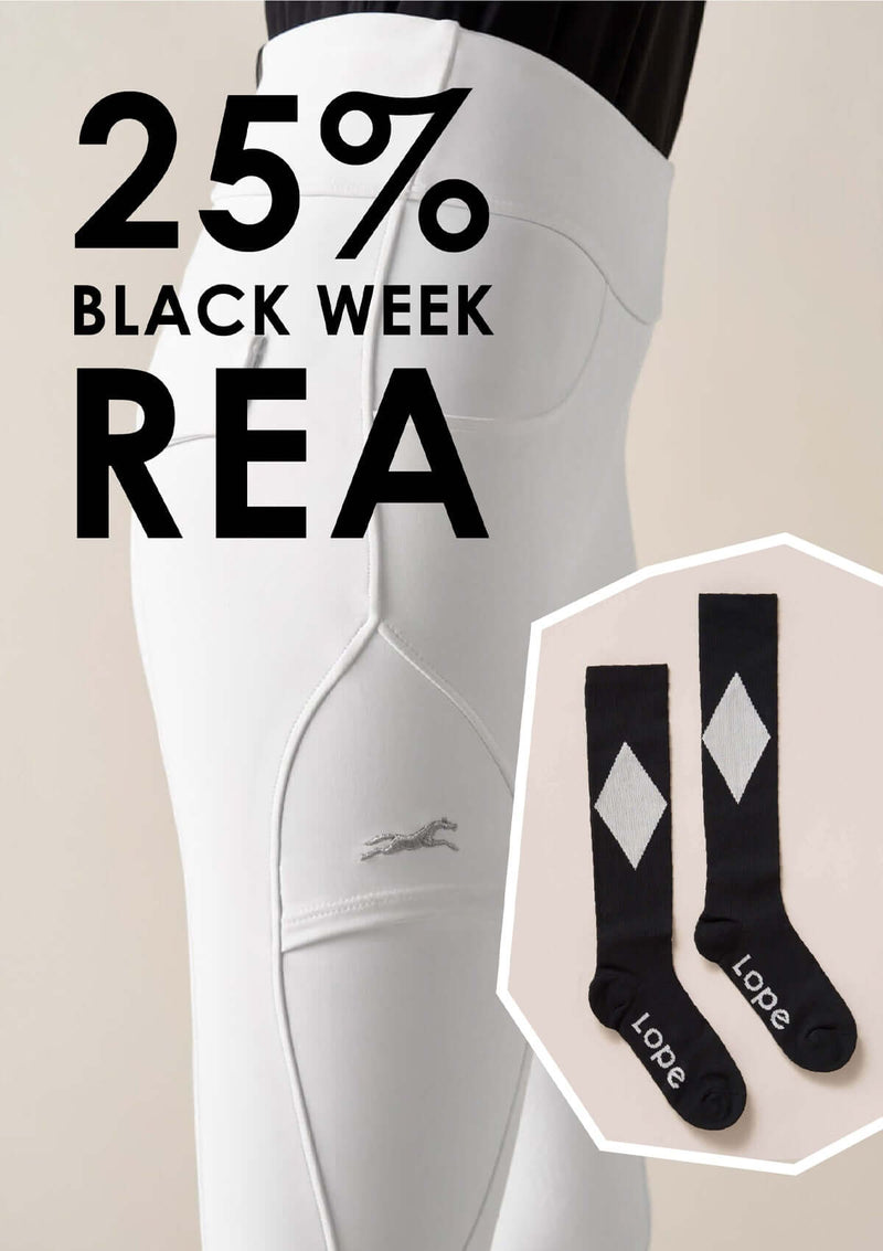 Black week deal på vita ridbyxor och strumpa till 25%