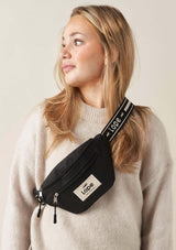Fancy -svart cross body och hip bag med justerbart band och smart förvaring