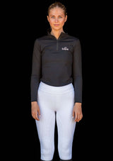 svart quarter zip funktions ridtröja. stretchig & mjuk. ridkläder dam. vita ridbyxor