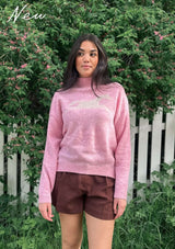 Lope wool polo knit tröja i 100 ull - Sommar Limited Edition.rosa sommar polo med häst motiv på bröstet i 100% ull